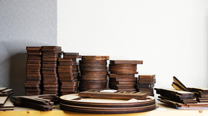 Eco friendly wooden blanks in carpentry craft workshop. Sustainable decor concept, zero waste. Master Class.