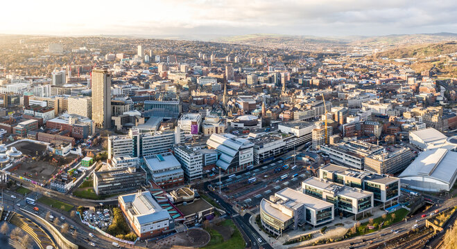 Fototapeta Aerial view of Sheffield city centre skyline at sunset