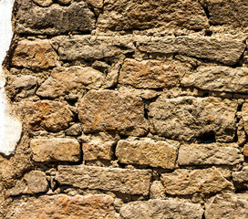 Old stone wall close up.