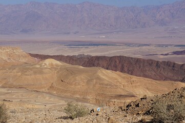Hiking on the Hurba Bodeda way in the mountains near Eilat, Israel with view of Aqaba