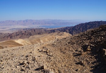 Hiking on the Hurba Bodeda way in the mountains near Eilat, Israel with view of Aqaba