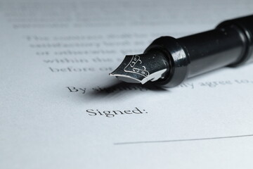 Fountain Pen placed next to signature blank