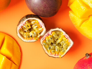 Composite image with with whole and halved exotic fruits - passionfruit and mango isolated on white background. As design element.
