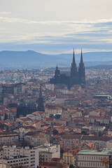 Fototapeta na wymiar View from the hill to the city of Clermont-Ferrand, located in the center of France