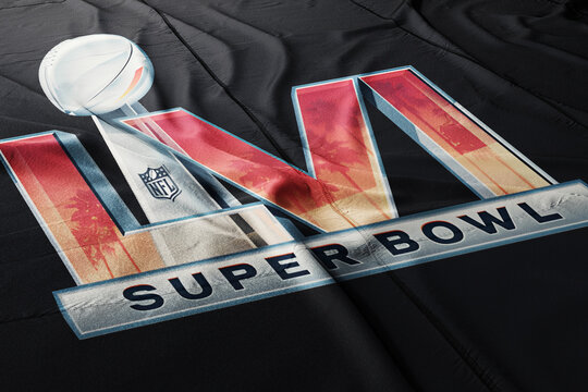 Superbowl 2022 LVI logo on cloth flag. Super Bowl LVI will be the 56th Super Bowl and the 52nd modern-era National Football League championship. The game is scheduled to be played on February 13, 2022