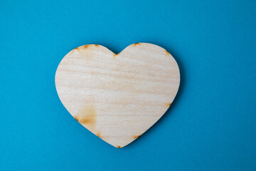 Top View Wooden Hearts placed nicely on a turquoise background happy Valentines day. 14th february. Close-up Copy space