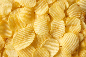 crispy golden potato chips snack texture background