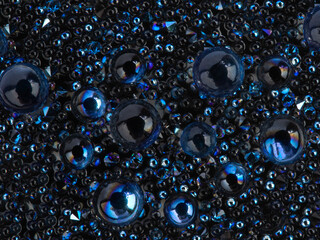 festive background of blue semi-precious crystals on a flat surface