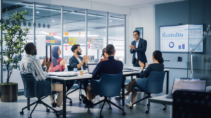 Multi-Ethnic Office Conference Room. Indian CEO does Presentation for Diverse Young Entrepreneurs,...