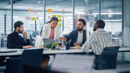 Diverse Modern Office: Successful Motivated Black Businesswoman Leads Meeting, talks of Company...