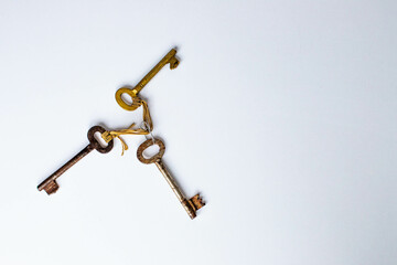Vintage three keys isolated on white background