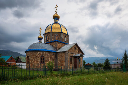 View of the Church of the Holy Martyrs Guria Samon and Aviva in the village of Khamyshki on a cloudy summer day, Republic of Adygea, Russia