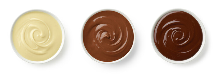 Set of various melted chocolate bowls (dark, milk and white) isolated on white background