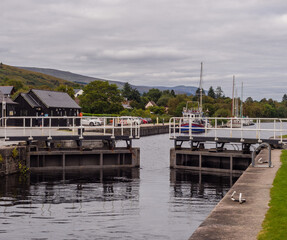 The famous and impressive Neptunes Staircase with lock gates openning, Fort William, Scotland, Uk
