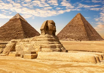 Foto op Canvas The Great Sphinx between the Khafre and Menkaure Pyramids of Giza, Cairo, Egypt © AlexAnton