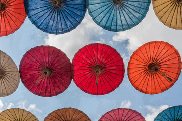 Paper Umbrella alley with blue sky in the background.
