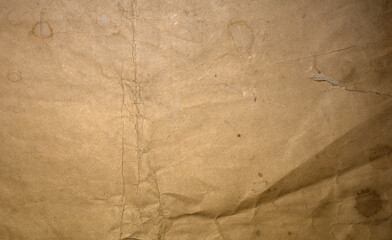 Photo of the texture of old crumpled paper.Paper background for text.