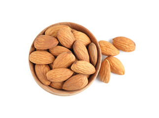 Wooden bowl and organic almond nuts on white background, top view. Healthy snack