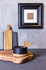Fototapeta na wymiar Ceramic cookware in a gray kitchen
