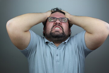 stressful male screams in panic, closes eyes in terror, keeps hands on head, finds out terrified...
