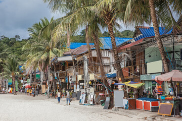 Seaside town in beautiful beach with white sand in Kaoh Touch beach; Koh Rong island, Cambodia
