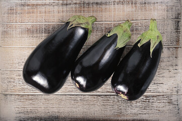 black eggplant on wooden background
