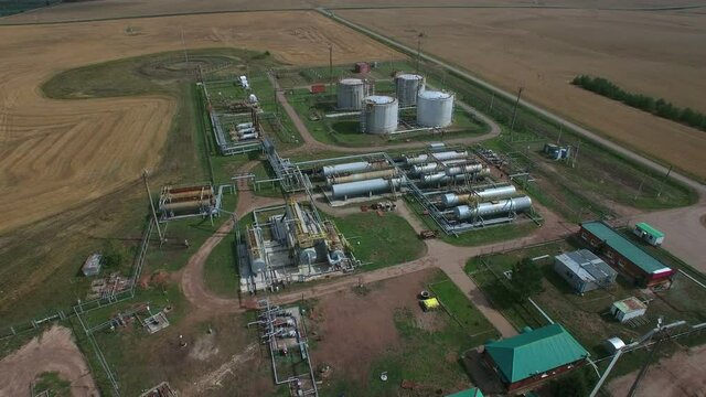 Aerial flying over of fuel and crude oil storage facilities. The oil and gas industry.