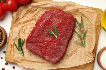 Concept of cooking with raw steak, top view