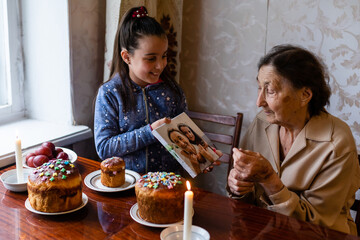 Easter. Very old grandmother and granddaughter