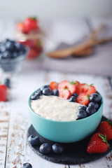 Milk rice with berries ready for breakfast