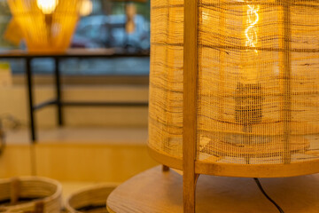 Handmade wicker lamps on wooden table. High quality photo