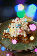 Tasty cake with cream close up