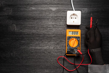 No mains voltage in the electric plug  concept. Electric voltmeter with zero on the display and...