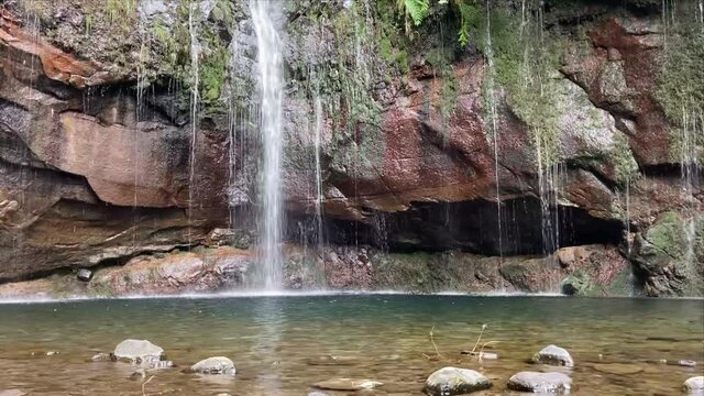 Beautiful waterfall Risco at Levada das 25 Fontes, Madeira island, Portugal.