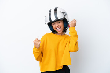 Woman with a motorcycle helmet celebrating a victory
