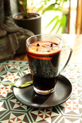 Mulled wine with cloves, cinnamon and orange.
  A warming drink