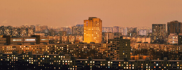 Fototapeta premium city skyline at night, cityscape at night, lights are on in the windows
