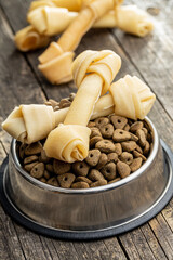 Delicacy for dogs. Chewing bone and dried food for dog
