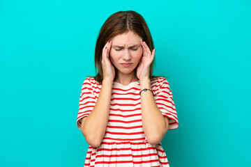 Fototapeta premium Young English woman isolated on blue background with headache