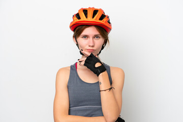 Young cyclist English woman isolated on white background thinking