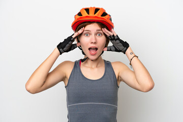 Young cyclist English woman isolated on white background with surprise expression