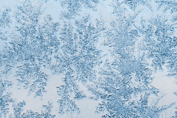 Abstract frosty pattern on glass, background texture