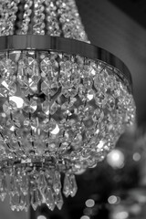 Naklejka na ściany i meble Close up of glass chandelier. Bright lights Decor Crystal Chandelier. High quality photo
