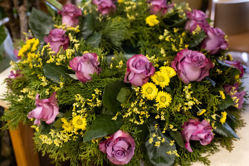 Bright beautiful bouquet of yellow and purple flowers, fragment, close. High quality photo