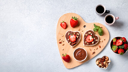 Breakfast for two, Valentines day food for couple in love with chocolate toasts and strawberry, web banner