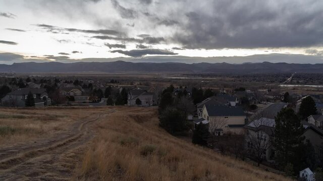 Littleton, Colorado, USA - TIME LAPSE sunset from Jackass Hill Park Mountains, Houses and Street