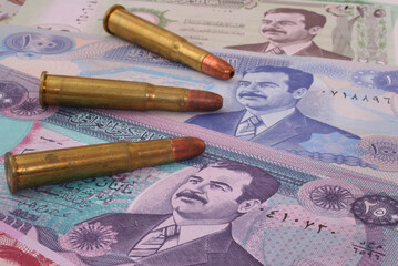 Currency From Iraq With Three Bullets, Close up