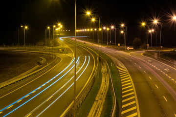 Naklejka na ściany i meble lights of cars with night. long exposure