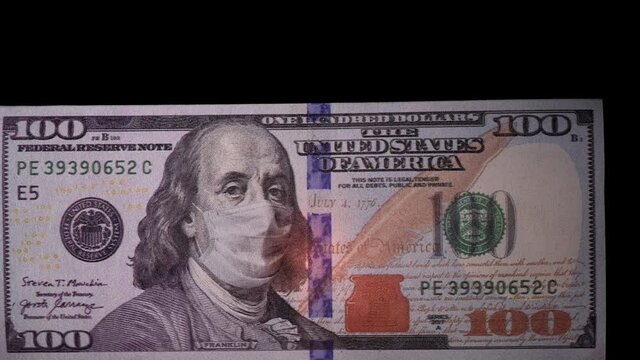 100 in a medical mask. The crisis in the global economy during the COVID-19 pandemic. High quality 4k footage