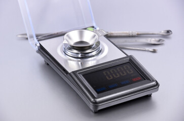 Precision Digital Jewelry Scale stock images. Portable modern mini pocket scale on a silver...